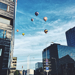 town city balloons modern hot air unexpected sky view highland travel real social UGC photography
